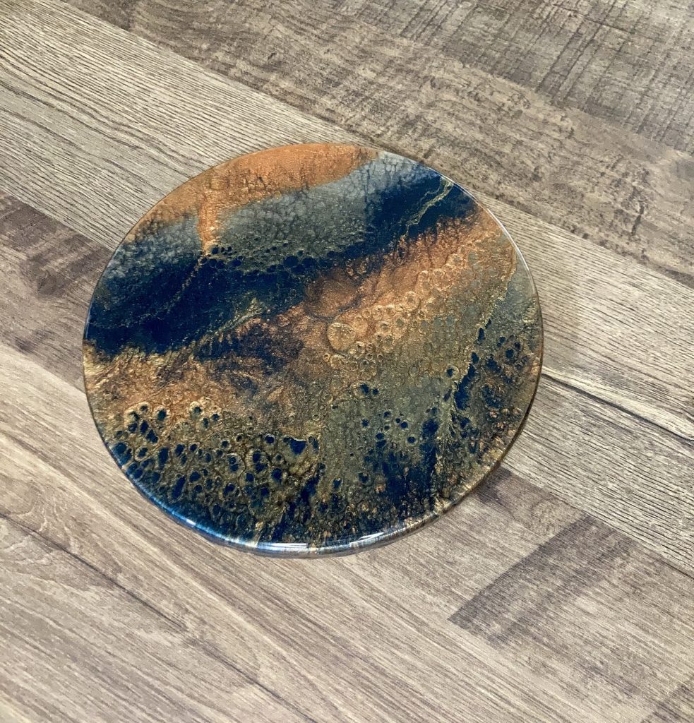 Small wood lazy susan with resin coating inspired by the dancing embers in a campfire.