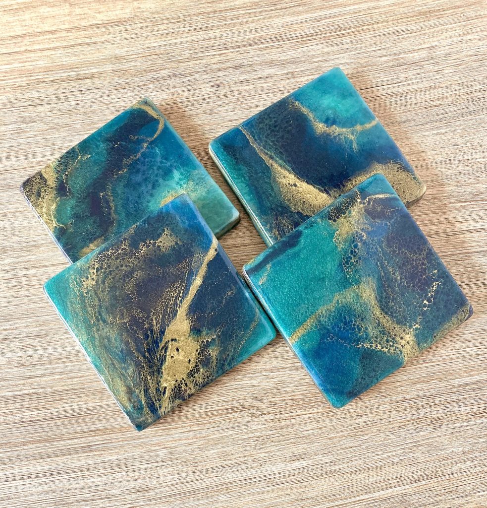 Set of four square Midnight Lake wood coasters.